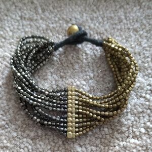 Elegant Gold and Silver Beaded Bracelet